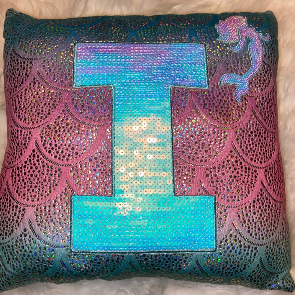 Justice “I” pillow